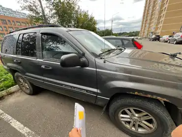 Автомобиль марки JEEP модель Grand Cherokee Lare 2003 г.в. VIN-номер 1J8GW48S64C178499