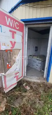 Земельный участок и расположенное на нём нежилое здание