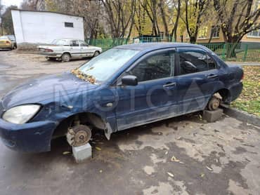 Mitsubishi Lancer, 2006 года, 82 лс, 150000 км еще