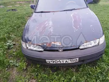 Mazda 626, 1996 года, 105 лс, 396 451 км