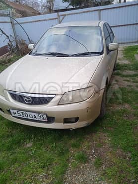 Mazda Familia, 2001 года, 85 лс, 420000 км, АКПП еще